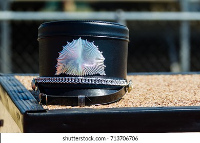 A Drum Majors Hat Resting On The Stand During Rehearsal