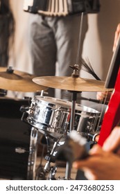 Drum set, close up view with selective focus. Live music background, vertical photo