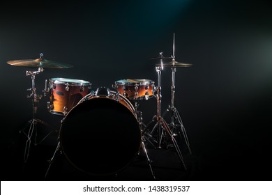drum set on a black background with a beautiful soft light, the concept of music