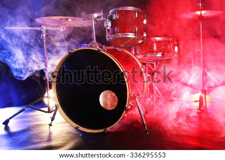 Drum set in smoke on a stage