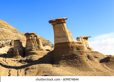 Drumheller badlands at the Dinosaur Provincial Park in Alberta, where rich deposits of fossils and dinosaur bones have been found. The park is now an UNESCO World Heritage Site.