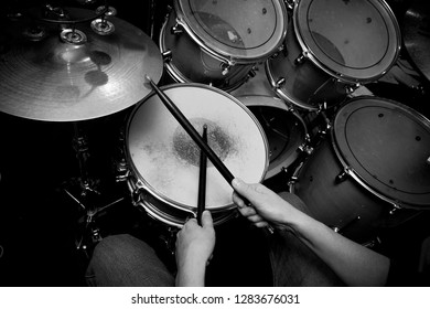 The drummer in action. A photo close up process play on a musical instrument 