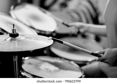 The Drummer Plays The Drums.