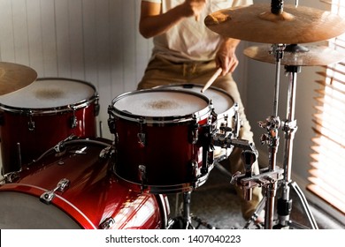 Drummer Practicing Rudiments On His Home Drum Kit.