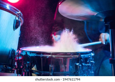 Drummer's rehearsing on drums before rock concert. Man recording music on drumset in studio - Powered by Shutterstock