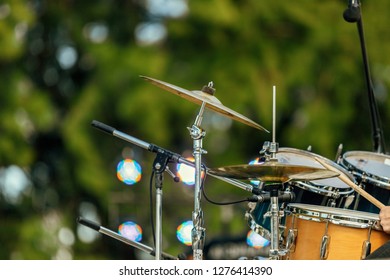 Drums With Cymbals And Microphones In An Outdoor Recital