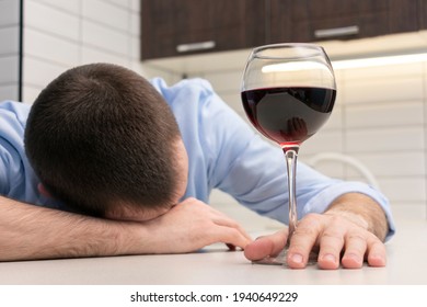 Drunk Alcohol Man And Wine Glass At Home, Man Suffering Alcoholism Problem And Addiction Intoxicated, Close-up