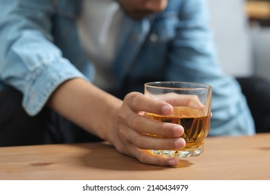 drunk asian man hold whisky glass addicted alcohol need therapy - Shutterstock ID 2140434979