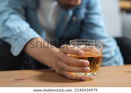 drunk asian man hold whisky glass addicted alcohol need therapy
