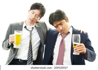 Drunk businessmen with beer - Powered by Shutterstock