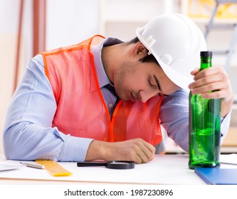 Drunk engineer working in the workshop