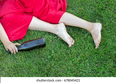 drunk girl sleeping in the park after the party. the problem of female alcoholism.