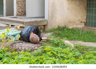 A Drunk Man Fell Asleep On The Ground