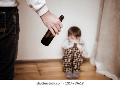 Drunk Parent And Little Scared Son. Violence Against Children Concept. Aggression In The Family. Alcohol Abuse. Domestic Violence