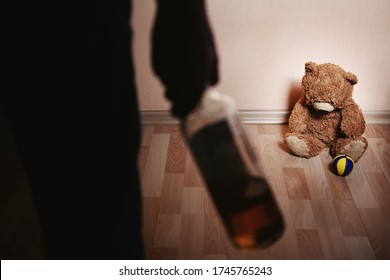 Drunk Parent And Little Scared Son. Violence Against Children Concept. Aggression In The Family. Alcohol Abuse. Domestic Violence