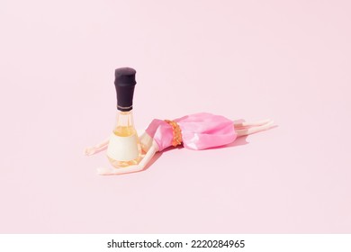 Drunk Woman In A Pink Dress Lay Down Beside Small Brandy Bottle.