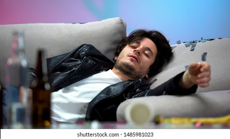 Drunk Young Man Sleeping On Couch After Night Long Party, Idle Life, Hangover