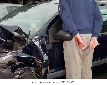 Drunken Driver Being Arrested After Car Crash