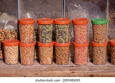 Dry Aquarium Fish Food Flakes In Plastic Containers