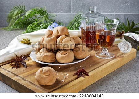 Dry biscuits to be consumed together with the sweet fortified wine Moscato, on the feast of San Martino, the period of the harvest. Sicilian folkloristic custom