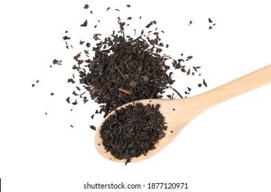 Dry Black Tea Leaves In Wooden Spoon Isolated On White Background, Top View