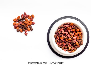 Dry Cat Food In Bowl On White Backgorund Top View Copy Space