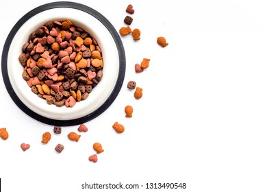 Dry Cat Food In Bowl On White Backgorund Top View Copy Space