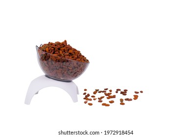 Dry Cat Food In Clear Plastic Bowl With White Stand Isolated On White Background.