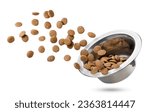 Dry cat food flies out of a bowl close-up on a white background. Isolated