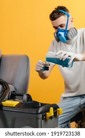 Dry Cleaner's Employee, Wearing Mask And Start Removing Dirt From Furniture In Flat. Professional Cleaning Company.