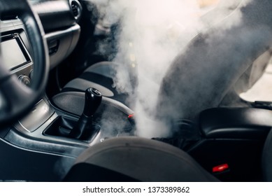 Dry Cleaning Of Car Interior With Steam Cleaner