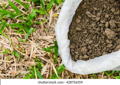 Dry Cow Dung In Bag,Dry Manure On Grass Background