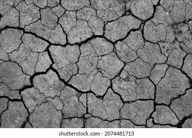 Dry cracked earth, parched land, Earth dirt texture background of brown mud, arid soil, Dry cracked earth texture, cracked earth, Dry mud, broken texture, desert, Global Warming, Climate Change. - Shutterstock ID 2074481713