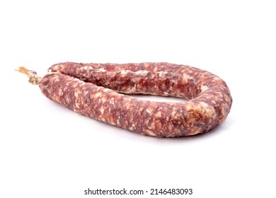 Dry cured pork sausage ring isolated on white background