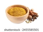 Dry curry powder in bowl and other spices isolated on white