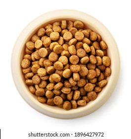 Dry Dog Food In Bowl Close Up On White Background, Isolated. The View From Top