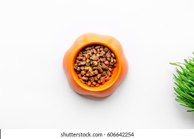 Dry Dog Food In Bowl On White Background Top View