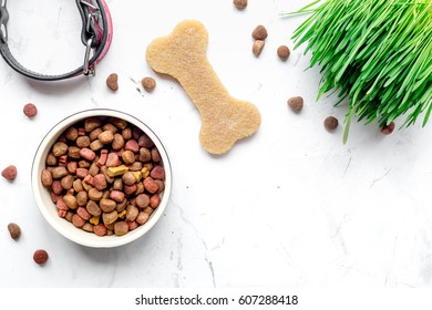 Dry Dog Food In Bowl On Stone Background Top View