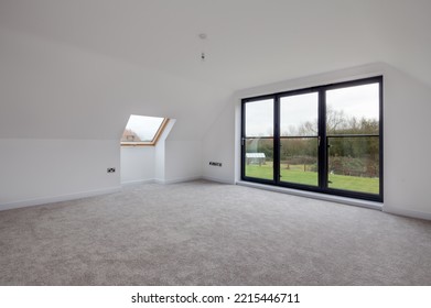 Dry Drayton, Cambridgeshire - Jan 10 2017: Contemporary Unfurnished Bedroom With Bifold Doors To Juliet Balcony