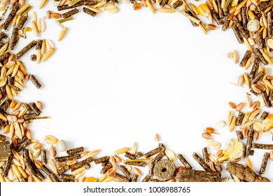 dry food for rodents on white background top view - Shutterstock ID 1008988765