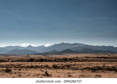Dry Grass Across Brown Field Below Mountains in Nevada's Great Basin National Park