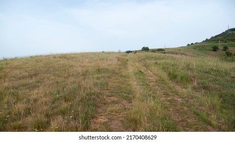 Dry Grass Hill In A Field