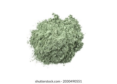 Dry green cosmetic clay isolated on white background. Heap of natural organic green cosmetic clay.