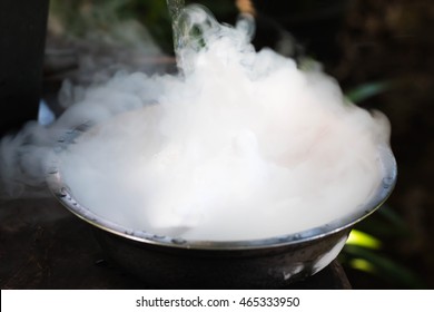 Dry Ice Smoke In Bowl On Blurred Background