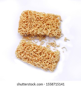 Dry instant noodles break on white background