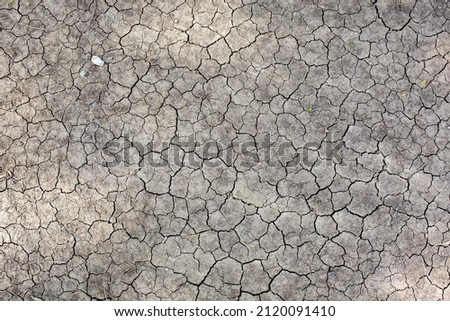 Dry land because it doesn't rain. Drought creates an unhealthy life. High resolution photo source. The ground, the soil, the mud, and the ground are split.