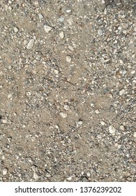 Dry Light Colored Rocky Dirt From An Urban Trail In Fullerton, CA By Some Service Covers.