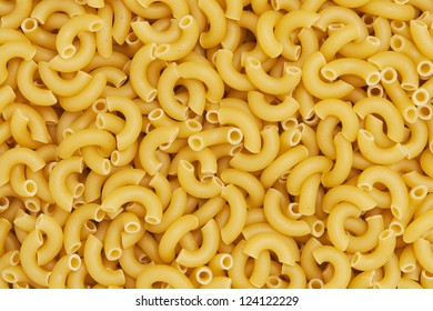 Dry Macaroni Pasta. Shot From Above And Filling The Frame.