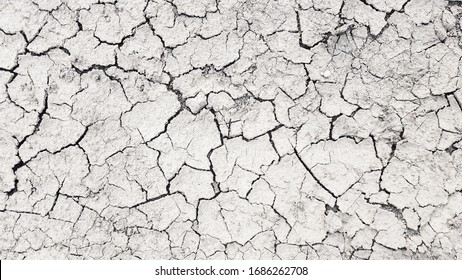 Dry mud cracked ground texture  Drought season background