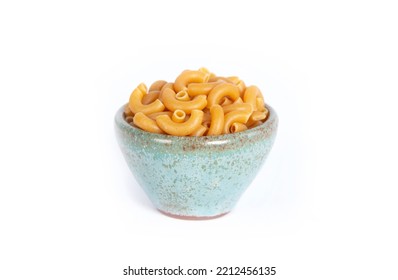 Dry Organic Chick Pea Pasta Uncooked In Small Green Pottery Bowl Isolated On White